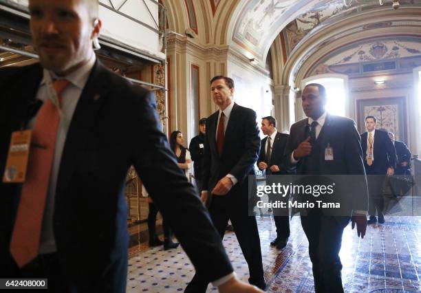 Director James Comey leaves the Capitol after a meeting on Capitol Hill on February 17, 2017 in Washington, DC. Comey met with Senate members for a...