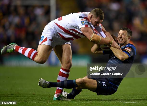 Danny McGuire of Leeds is tackled by Danny Tickle of Leigh during the Betfred Super League match between Leigh Centurions and Leeds Rhinos at Leigh...