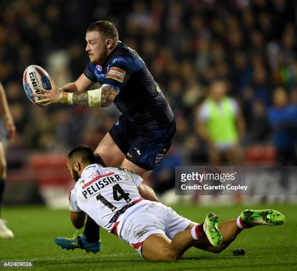 Brad Singleton of Leeds gets past Eloi Pelissier of Leigh during the Betfred Super League match between Leigh Centurions and Leeds Rhinos at Leigh...