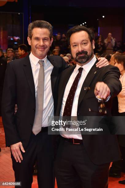 Producer Simon Kinberg and director James Mangold attend the 'Logan' premiere during the 67th Berlinale International Film Festival Berlin at...