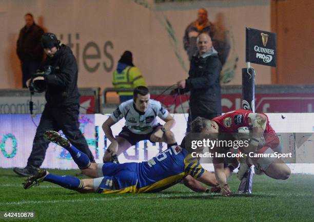 Scarlets' Steffan Evans scores his sides first try during the Guinness PRO12 Round 15 match between Scarlets and Zebre at Parc y Scarlets on February...