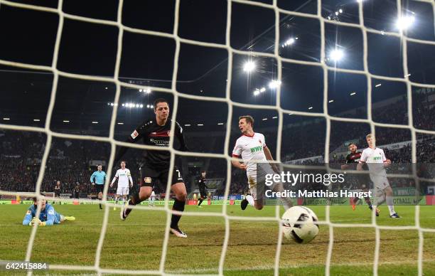 Javier Hernandez of Leverkusen scores the third goal during the Bundesliga match between FC Augsburg and Bayer 04 Leverkusen at WWK Arena on February...