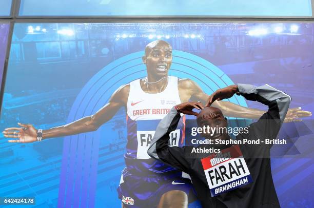 Mo Farah of Great Britain poses for a photograph during a photo call ahead of the Muller Indoor Grand Prix 2017 at the Barclaycard Arena on February...