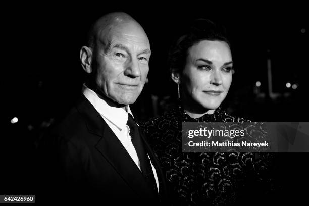 Actor Patrick Stewart and his wife Sunny Ozell attend the "Logan" premiere during the 67th Berlinale International Film Festival on February 17, 2017...