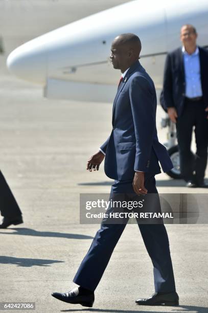 Haitian President, Jovenel Moise arrives at Toussaint Louverture International Airport, in the Haitian capital, Port-au-Prince, on February 17 after...