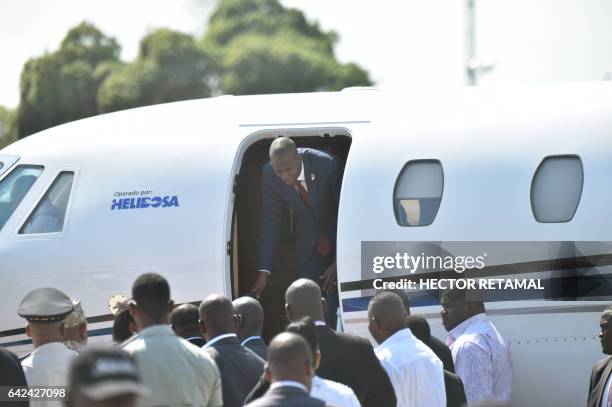 Haitian President, Jovenel Moise arrives at Toussaint Louverture International Airport, in the Haitian capital, Port-au-Prince, on February 17 after...