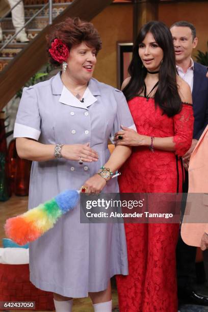 Raul Gonzalez and Giselle Blondet are seen on the set of "Despierta America" during the 20 Year Anniversary special at Univision Studios on February...