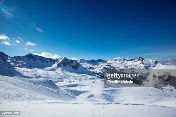 beautiful winter mountains on a bright sunny day - andorra stock pictures, royalty-free photos & images