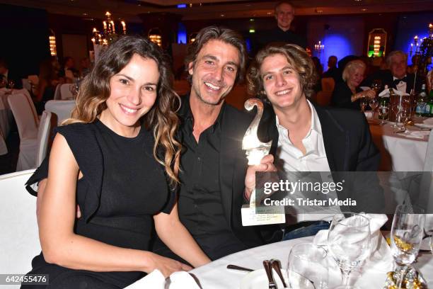 Cristina d'Alberto, Daniele Liotti and Francesco Liotti attend the Notte Delle Stelle - Premio Bacco At Hotel Maritim During 67th International Film...