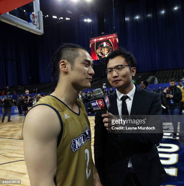 Jiang Jinfu of the West team is interviewed during the 2017 NBA All-Star Celebrity Game as part of 2017 All-Star Weekend at the Mercedes-Benz Super...