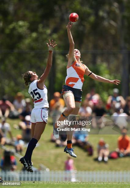 Erin McKinnon of the Giants is challenged by Kelly Clinch of the Dockers during the Women's round three match between Greater Western Sydney Giants...