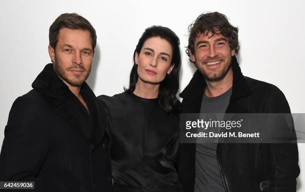 Paul Sculfor, Erin O'Connor and Robert Konjic attend the British Fashion Council Fashion Film x River Island film screening and cocktail party at The...