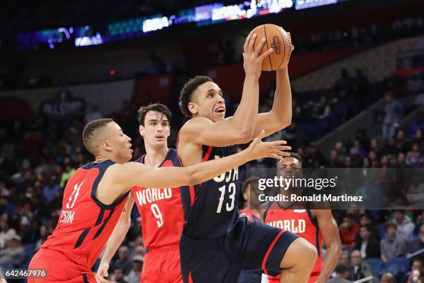 Malcolm Brogdon of the Milwaukee Bucks drives to the basket against Dante Exum of the Utah Jazz in the second half of the 2017 BBVA Compass Rising...