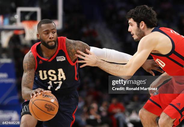 Jonathan Simmons of the San Antonio Spurs dribbles the ball against Alex Abrines of the Oklahoma City Thunder in the second half of the 2017 BBVA...