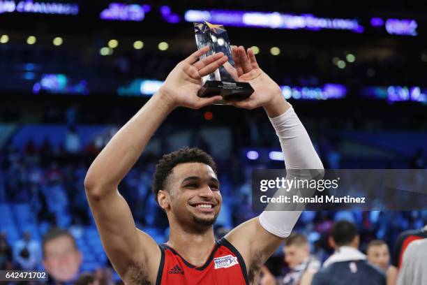 Jamal Murray of the Denver Nuggets celebrates with the 2017 BBVA Compass Rising Stars Challenge MVP trophy after the World Team defeated the US Team...