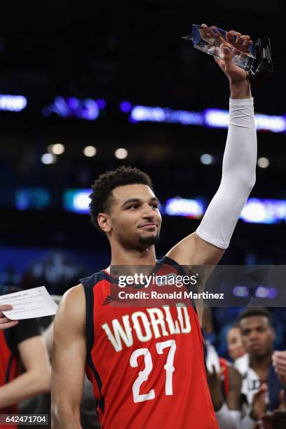 Jamal Murray of the Denver Nuggets celebrates with the 2017 BBVA Compass Rising Stars Challenge MVP trophy after the World Team defeated the US Team...