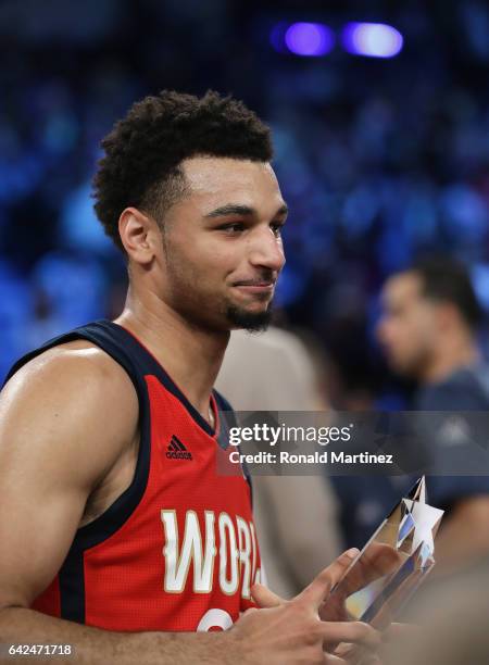 Jamal Murray of the Denver Nuggets celebrates with the 2017 BBVA Compass Rising Stars Challenge MVP trophy after the World Team defeated the US Team...