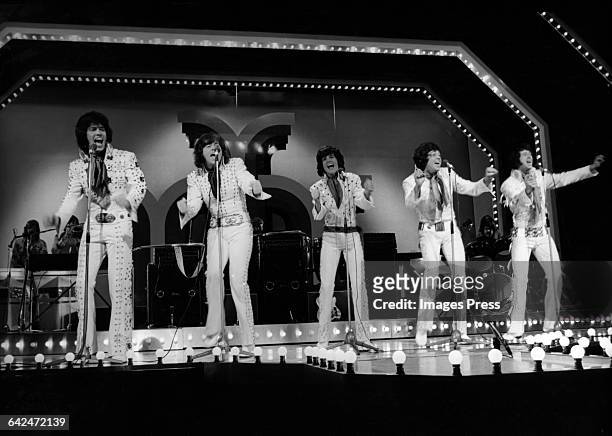 The Osmonds on stage at the London Palladium circa 1973 in London, England.