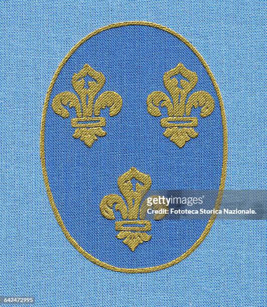 Fleur de Lys, the "Lily of France", the emblem of the French monarchy. First appeared in the coat of arms without a defined number, the number has...