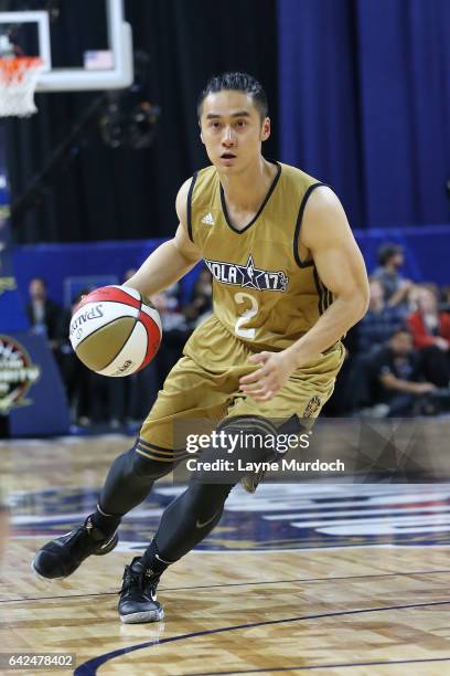 Jiang Jinfu of the West Team handles the ball during the 2017 NBA All-Star Celebrity Game as part of 2017 All-Star Weekend at the Mercedes-Benz Super...