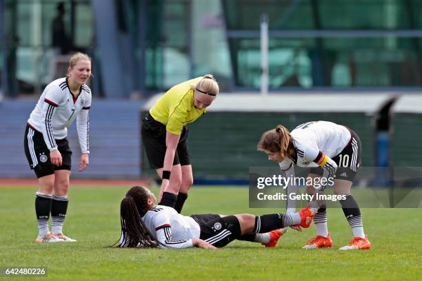 Marije Deuring sees Michelle Klostermann of Germany U16 Girls injured observed by Pauline Wimmer and Pauline Berning of Germany U16 Girls during the...