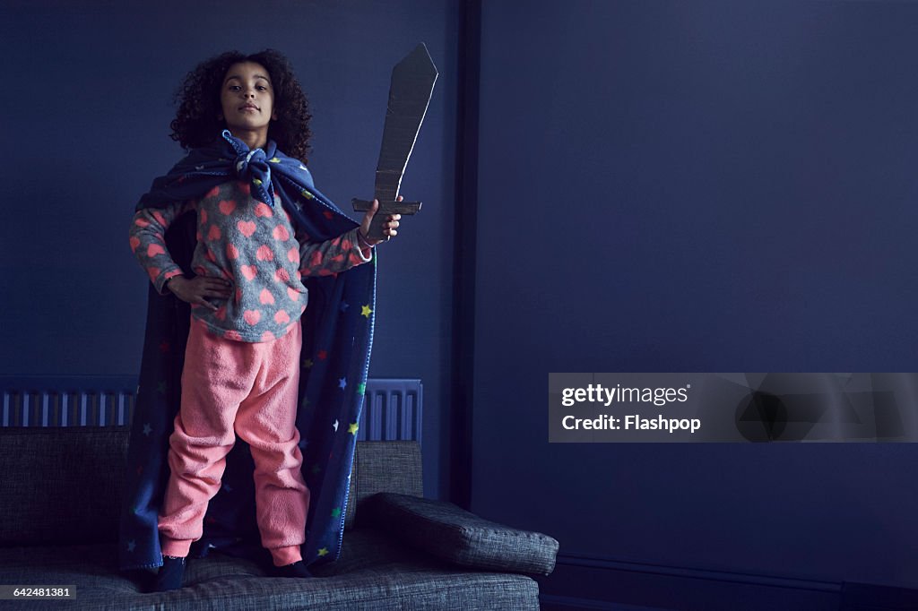 Portrait of girl dressed as a Superhero