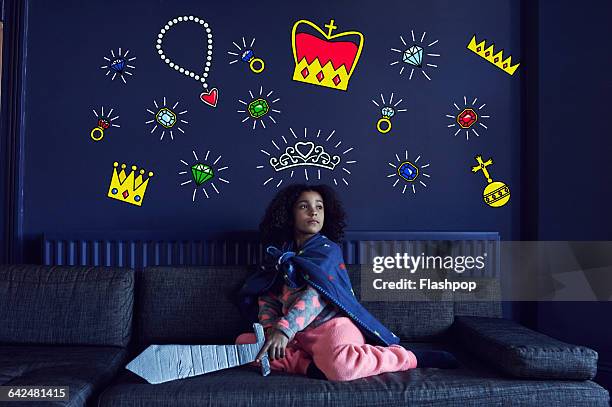 girl playing make believe - superman reveal stock pictures, royalty-free photos & images