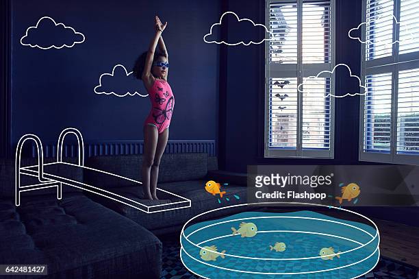 gir diving into imaginary pool - young girl swimsuit stockfoto's en -beelden