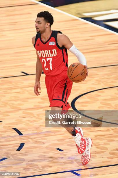 Jamal Murray of the World Team handles the ball during the BBVA Compass Rising Stars Challenge as part of 2017 All-Star Weekend at the Smoothie King...