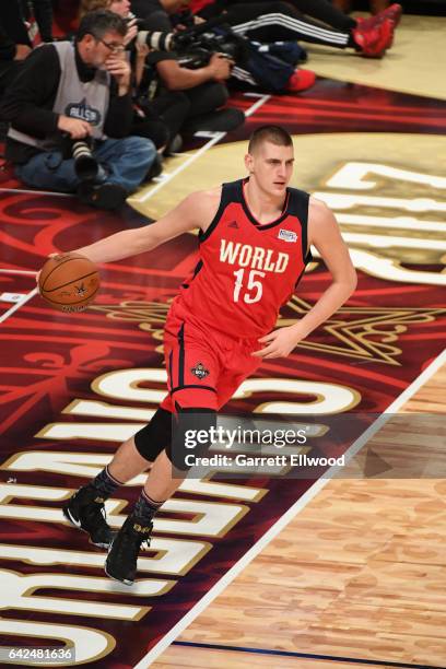 Nikola Jokic of the World Team inbounds the ball during the BBVA Compass Rising Stars Challenge as part of 2017 All-Star Weekend at the Smoothie King...