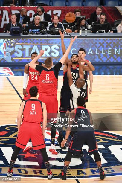The opening tip off between the World Team and the USA Team during the BBVA Compass Rising Stars Challenge as part of 2017 All-Star Weekend at the...