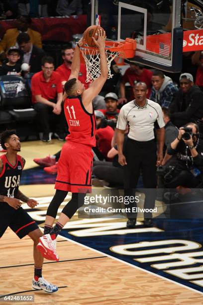 Dante Exum of the World Team goes up for a dunk during the BBVA Compass Rising Stars Challenge as part of 2017 All-Star Weekend at the Smoothie King...