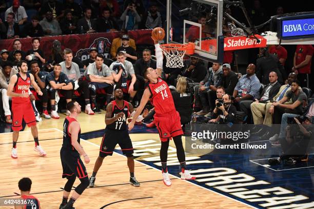 Willy Hernangomez of the World Team goes up for a dunk during the BBVA Compass Rising Stars Challenge as part of 2017 All-Star Weekend at the...