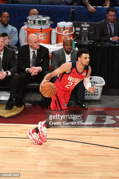 Jamal Murray of the World Team handles the ball during the BBVA Compass Rising Stars Challenge as part of 2017 All-Star Weekend at the Smoothie King...