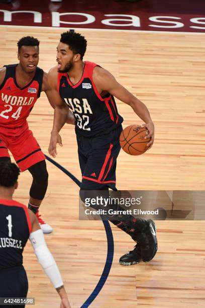 Karl-Anthony Towns handles the ball during the BBVA Compass Rising Stars Challenge as part of 2017 All-Star Weekend at the Smoothie King Center on...