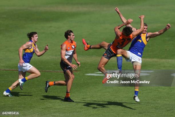 Rory Lobb of the Giants and Nathan Vardy of the Eagles compete for a mark during the 2017 JLT Community Series match between Greater Western Sydney...