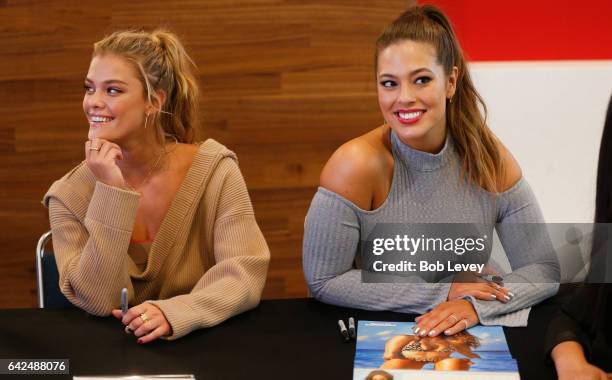 Swimsuit models Nina Agdal and Ashley Graham sign copies of the 2017 SI Swimsuit edition at the VIBES by Sports Illustrated Swimsuit 2017 launch...