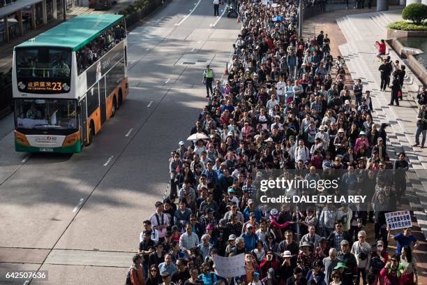 Supporters of the seven police officers, who were found guilty on February 14 of assaulting activist Ken Tsang during the 2014 pro-democracy...