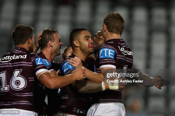 Dylan Walker of the Sea Eagles celebrates with his team during the NRL Trial match between the Manly Warringah Sea Eagles and Sydney Roosters at...