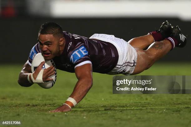 Dylan Walker of the Sea Eagles scores the game winning try during the NRL Trial match between the Manly Warringah Sea Eagles and Sydney Roosters at...