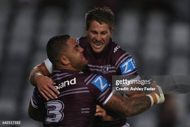 Dylan Walker of the Sea Eagles celebrates with his team during the NRL Trial match between the Manly Warringah Sea Eagles and Sydney Roosters at...