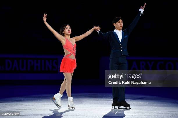 Gold medalists Wenjing Sui and Cong Han of China wave for fans prior to the medals ceremony of the Pairs during ISU Four Continents Figure Skating...