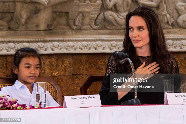 Angelina Jolie shows appreciation to actors that were in her last movie "First They Killed My Father" during a press conference set up at the Raffles...