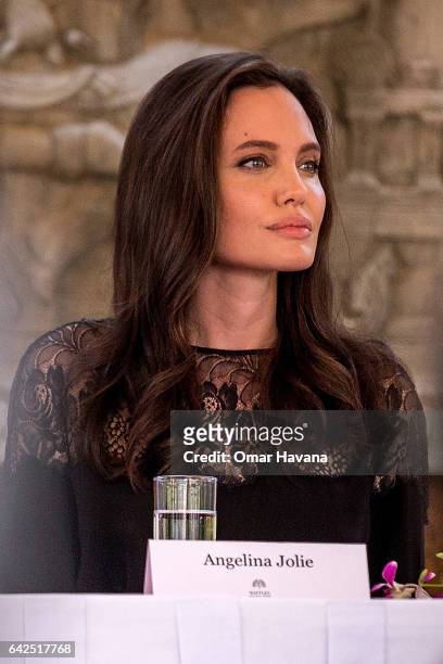 Angelina Jolie talks to press during a press conference ahead of the premiere of her new movie "First They Killed My Father" set up at the Raffles...