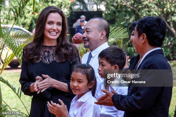 Angelina Jolie and producer Rithy Panh chat with actors before holding a press conference ahead of the premiere of their new film "First They Killed...