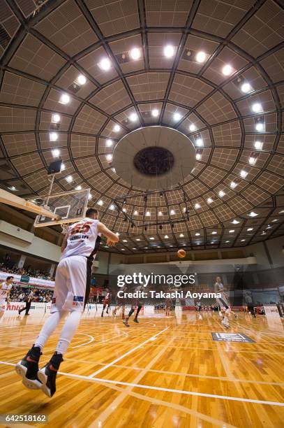 Josh Harrellson of the Osaka Evessa passes the ball during the B.League game between Toshiba Kawasaki Brave Thunders and Osaka Evessa at Hiratsuka...