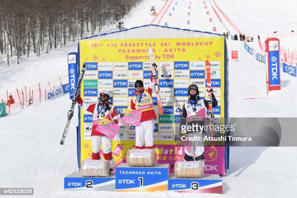 Benjamin Cavet of France , Mikael Kingsbury of Canada , Philippe Marquis of Canada celebrate after winning the men's moguls during 2017 FIS Freestyle...
