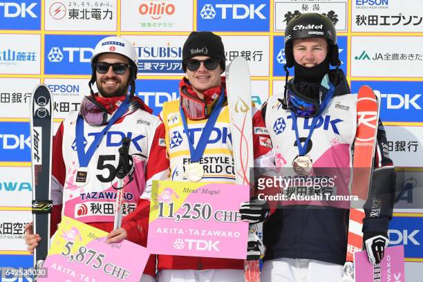 Philippe Marquis of Canada , Mikael Kingsbury of Canada , Benjamin Cavet of France , pose on the podium during 2017 FIS Freestyle Ski World Cup...