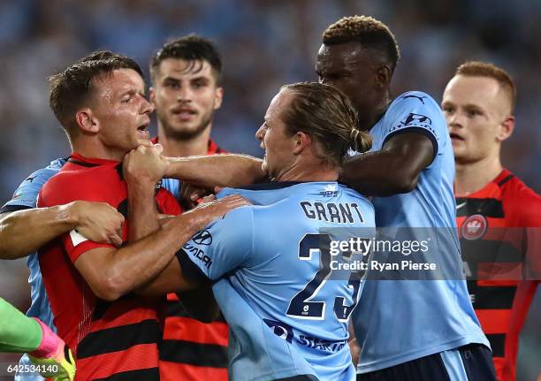 Brendon Santalab of the Wanderers clashes with Rhyan Grant of Sydney FC during the round 20 A-League match between the Western Sydney Wanderers and...