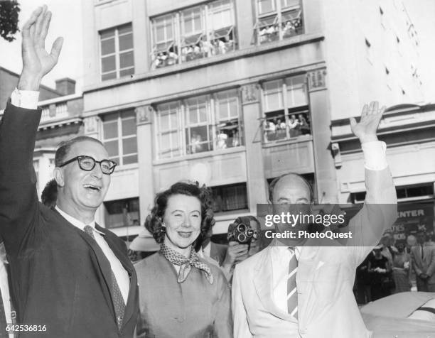 Democratic Vice-presidential nominee Estes Kefauver , his wife Nancy Kefauver , and Presidential nominee Adlai Stevenson II wave as they arrive to...